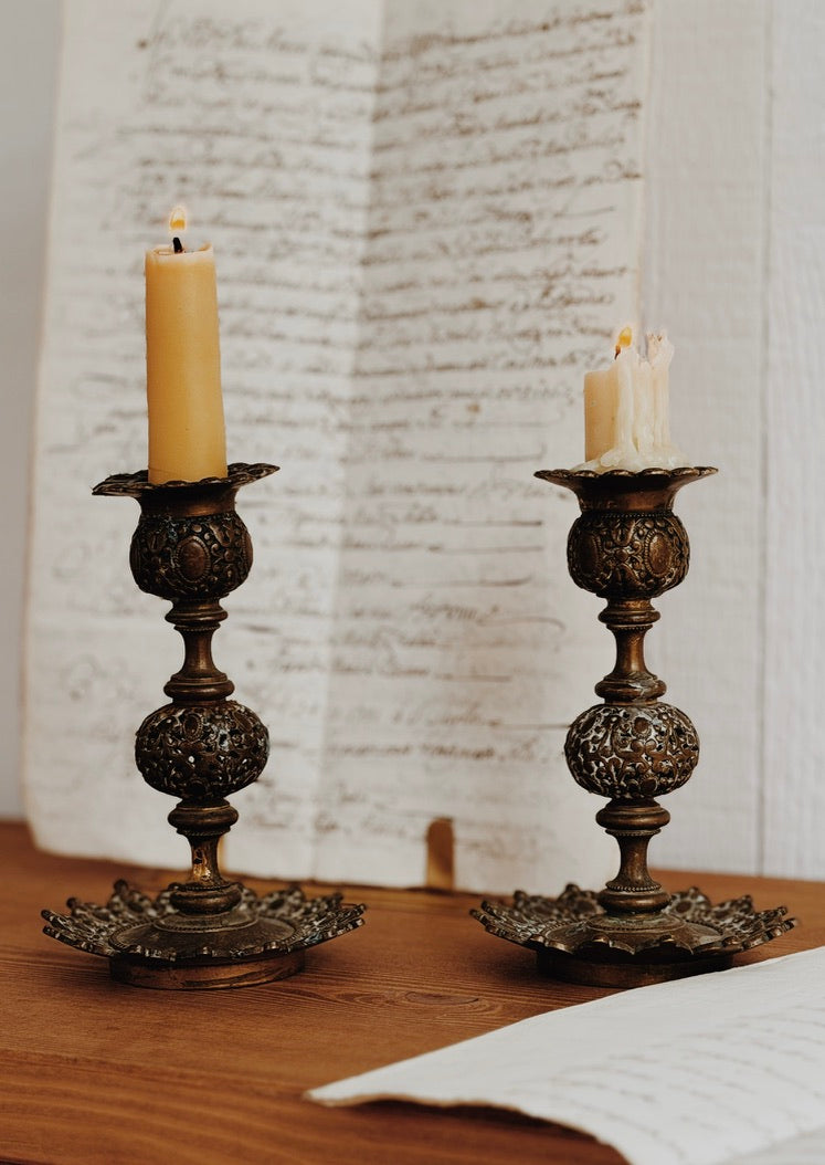 Pair of Antique French Brass Candlesticks with Pierced and Repoussé Detail