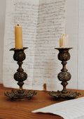 Pair of Antique French Brass Candlesticks with Pierced and Repoussé Detail