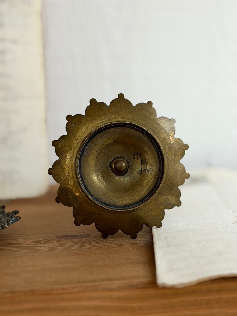 Pair of Antique French Brass Candlesticks with Pierced and Repoussé Detail